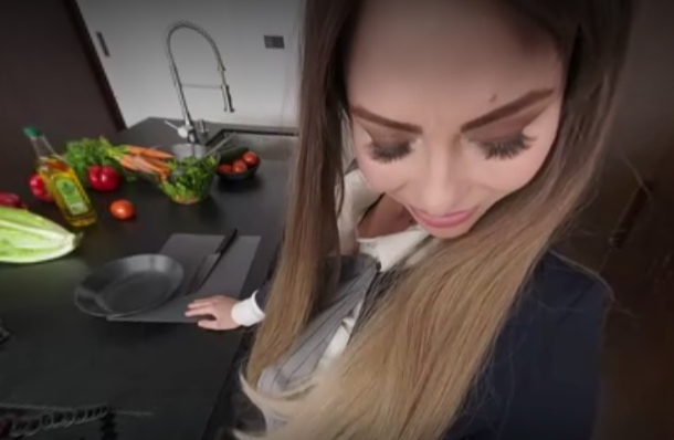 She is on the menu too image of cookery teacher looking shocked at students vr cookery filming as he brushes under her skirt