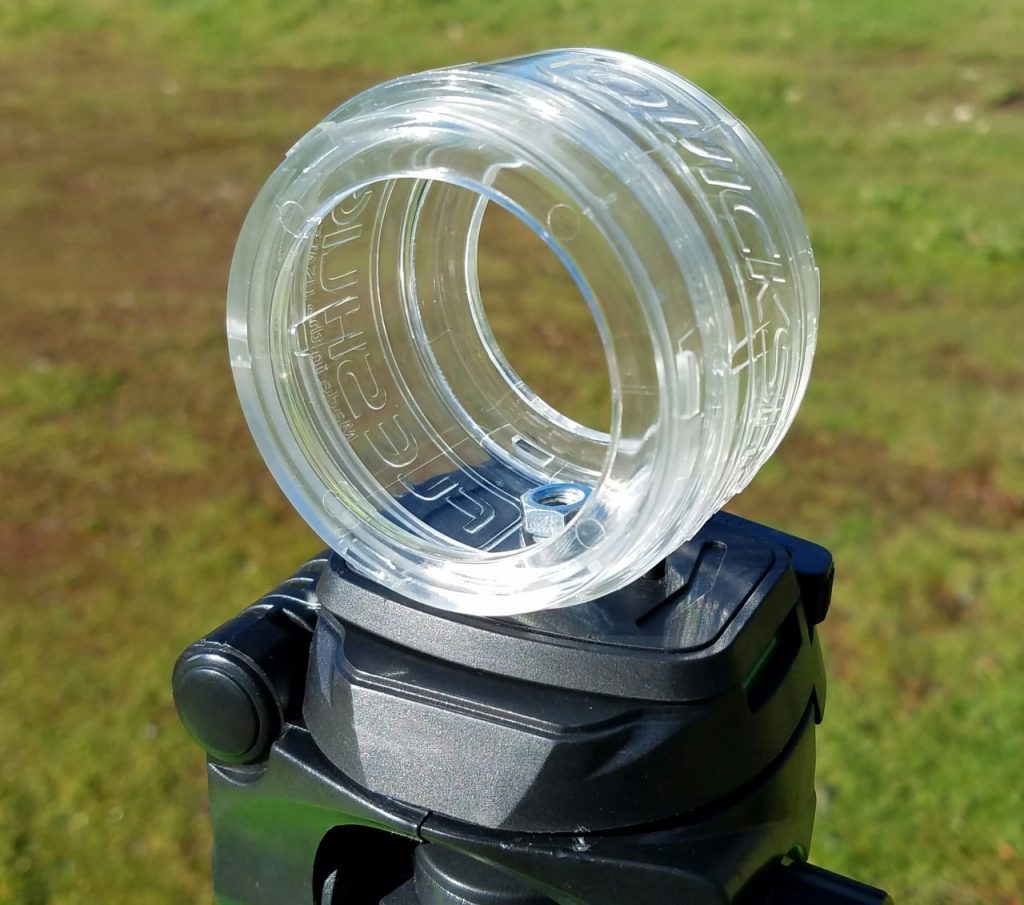 Securing a fleshlight casing to a bolt threaded through a camera mount plate