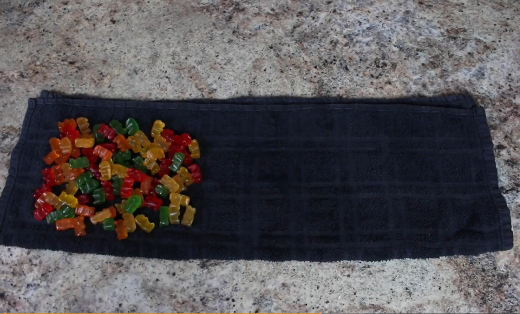 Gummi Bears laid out on hand towel for a DIY vagina