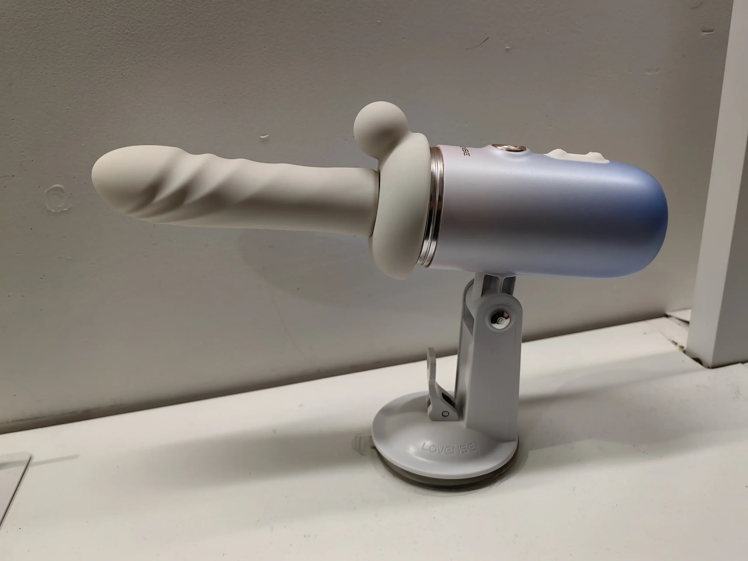Lovense Spinel In suction mount with straight dildo and its bulbous clit ball pleasurer