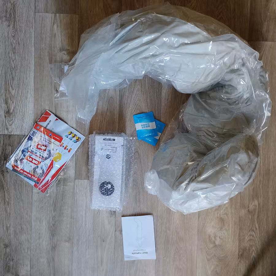 all the bits and peices in the box from the dakimakura s shaped pillow onahole product